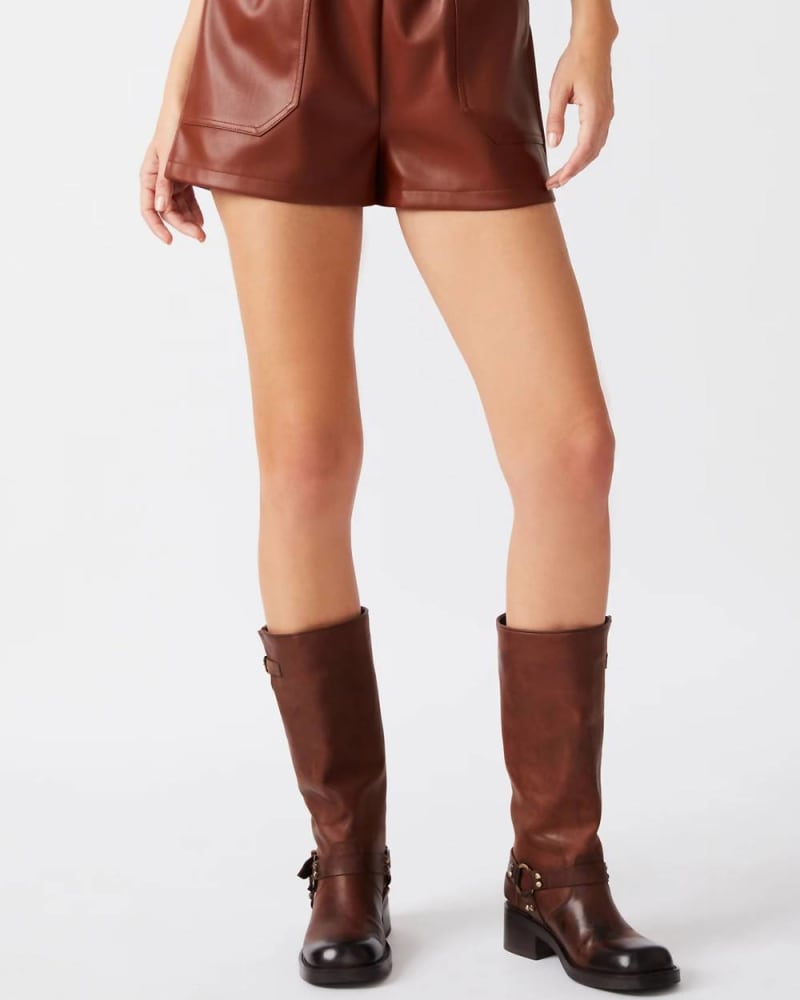 Front of a model wearing a size XL Faux The Record Short In Cognac in Cognac by STEVE MADDEN. | dia_product_style_image_id:353336